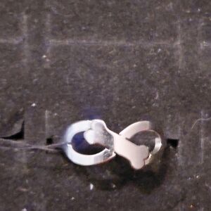 RARE SUNDANCE" ETERNITY DOG BONES FOREVER"" STERLING SILVER RING.